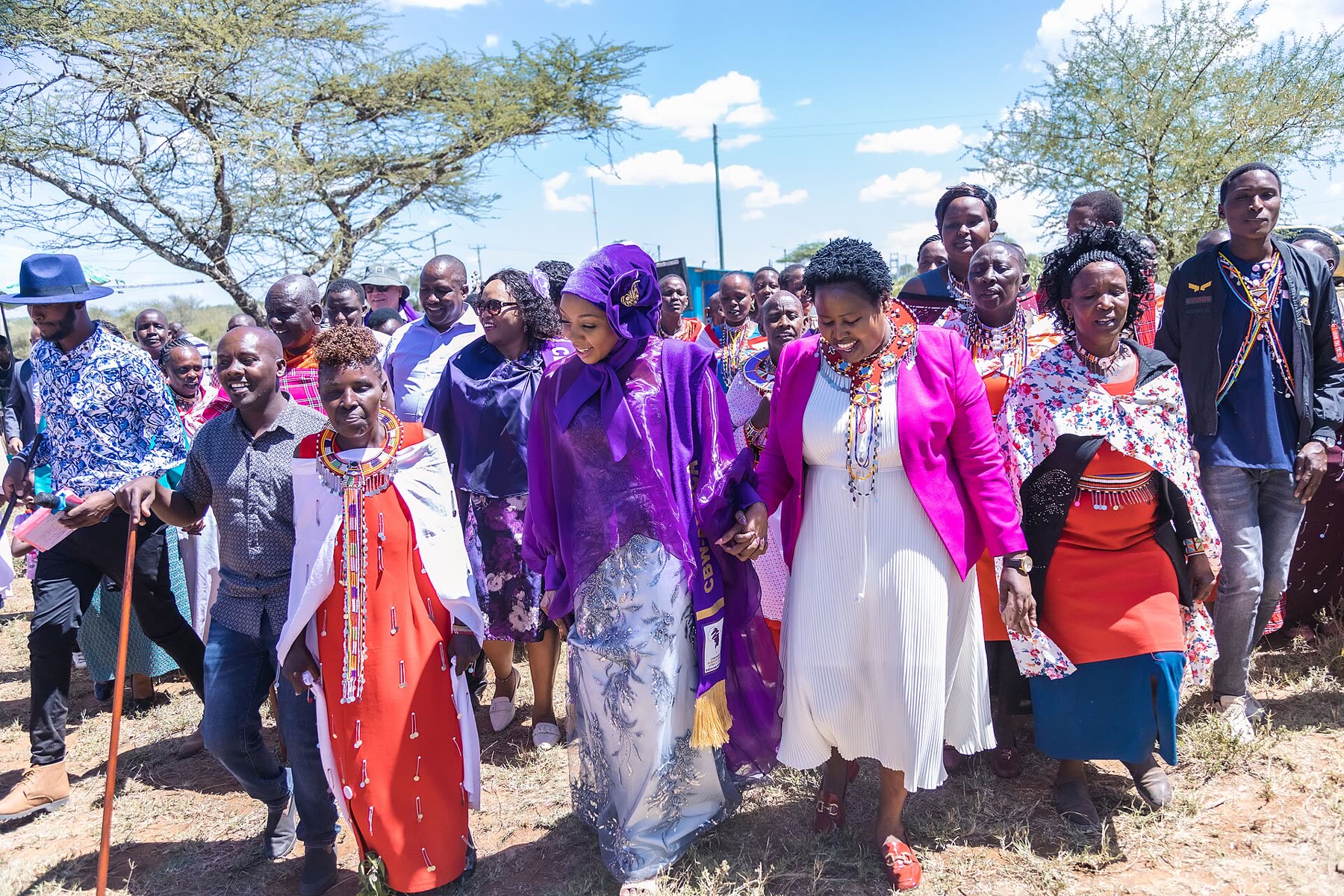 Women walking together to a gathering