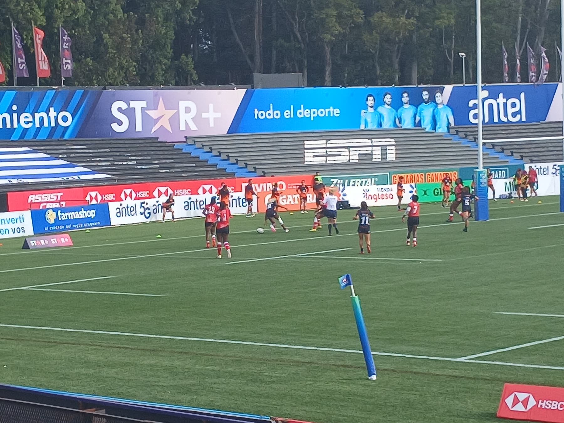Rugby sevens players on a pitch